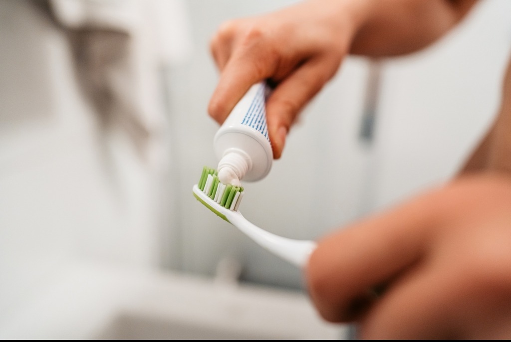 Dentist issues urgent warning to anyone who brushes their teeth in the shower